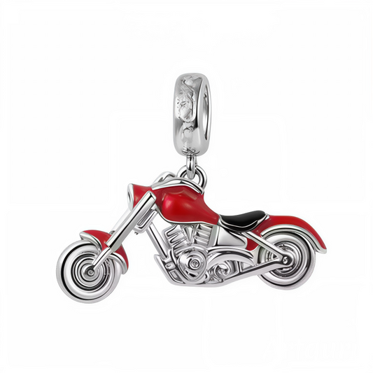 Ajoutez une touche de style audacieux et moderne à votre collection avec ce charm pendentif unique représentant une moto rouge. Sa silhouette raffinée et ses détails précis capturent l’esprit de liberté et d’aventure, parfait pour les passionnés de motos ou les amateurs de designs élégants et contemporains.

Fabriqué en argent 925, ce bijou se distingue par ses finitions soignées et son éclat subtil. La teinte rouge intense met en valeur le design sophistiqué de la moto, ajoutant une note de caractère et d’