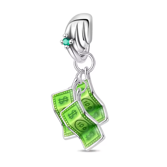 Affichez votre passion pour la réussite et l’abondance avec ce charm pendentif en argent 925 représentant une pile de billets verts. Symbole de chance et de prospérité, ce bijou au design raffiné et contemporain est idéal pour celles et ceux qui aiment les pièces originales et significatives.