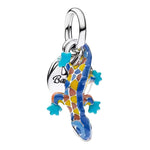 Apporte une touche originale et symbolique à ton bracelet avec ce charm pendentif salamandre. Inspiré de l’univers animal et mystique, ce bijou met en valeur une salamandre élégante avec des finitions soignées et un style plein de caractère. Un charm délicat et raffiné, parfait pour celles et ceux qui aiment les bijoux uniques et inspirés de la nature.

Caractéristiques :

- Matière : Argent 925.
- Design : Salamandre en version pendentif avec finitions soignées.
- Dimensions : Taille délicate et confortabl