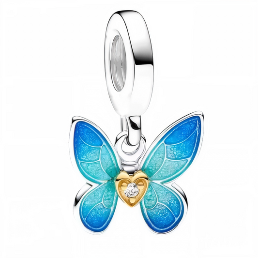 Apportez une touche délicate et élégante à votre collection avec ce charm pendentif en Argent 925 (S925), représentant des ailes de papillon bleu avec un cœur doré en son centre. Un bijou raffiné et charmant parfait pour sublimer vos bracelets ou colliers.

Caractéristiques
– Matière : Argent 925 (S925).
– Design : Ailes de papillon bleu avec cœur doré détaillé.
– Coloris : Bleu vif avec cœur doré brillant.
– Compatibilité : Convient aux bracelets à charms type Pandora et colliers.
– Style : Délicat, élégan