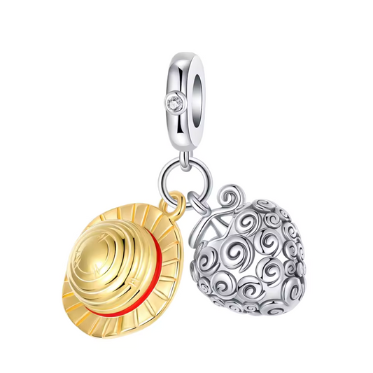 Plongez dans l'univers fascinant de One Piece avec ce charm pendentif Fruit du Démon en argent sterling 925. Ce charm détaille le fruit mystérieux et puissant qui confère des pouvoirs extraordinaires à ses utilisateurs. Avec son design détaillé et vibrant, ce pendentif est idéal pour les fans de la série qui souhaitent ajouter une touche de magie et de mystère à leur collection. Compatible avec les bracelets Pandora, il est le choix parfait pour les amateurs d'aventures et de trésors.