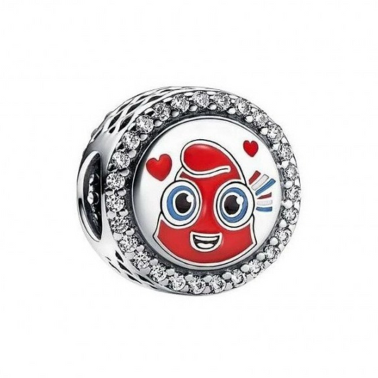 Célébrez l’esprit des Jeux Olympiques 2024 avec ce charm rond unique, mettant en avant la Phryge, la mascotte emblématique de cet événement mondial. En argent 925, ce bijou est un hommage à la passion sportive, à l’excellence et à l’unité internationale.