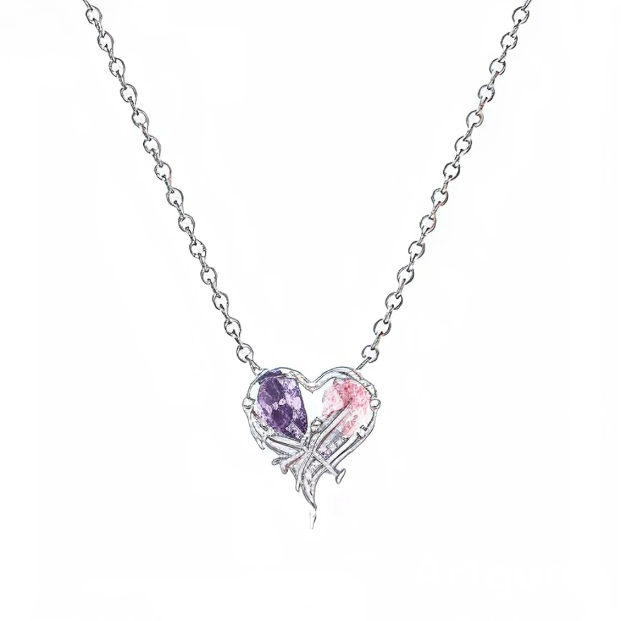 Ce collier en métal argenté présente un pendentif cœur formé de deux pierres facettées, l’une violette et l’autre rose, qui se rejoignent pour créer un seul cœur lumineux. La monture fine est soulignée de petites touches de brillants et de courbes entrelacées à la base du cœur, donnant l’impression de rubans qui l’enserrent délicatement.

Caractéristiques :
Matière : Métal argenté avec pierres synthétiques violette et rose, et petits cristaux clairs.
Design : Deux moitiés de cœur colorées fusionnées, retenu