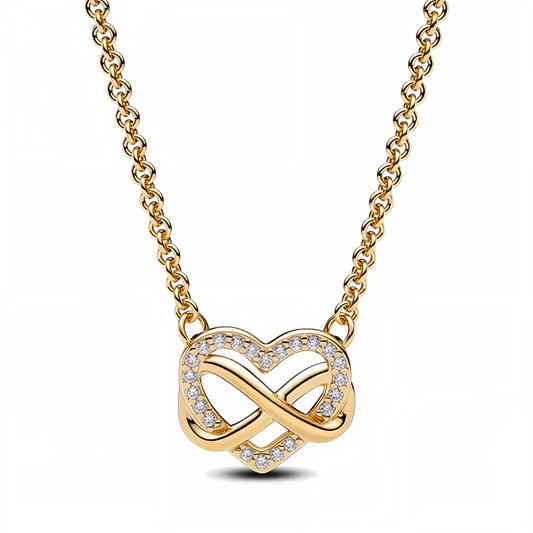 Incarnez l’amour intemporel avec élégance grâce à ce collier raffiné au design symbolique. Son pendentif ajouré associe harmonieusement un cœur et un symbole d’infini, formant une danse poétique qui célèbre les liens éternels. Son éclat doré et ses détails scintillants en font un bijou aussi expressif qu’élégant, parfait pour toutes les occasions.