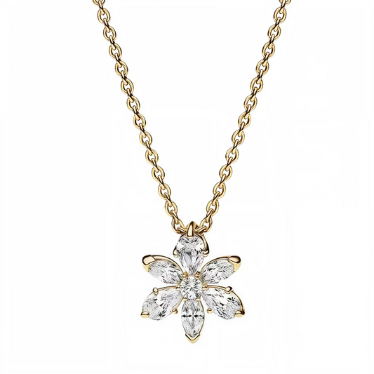 Laissez-vous séduire par l’éclat de la nature avec ce collier à pendentif herbier scintillant. Inspiré des formes florales, ce bijou raffiné est orné d’oxydes de zirconium cubiques taillés en marquise, poire et rond pour créer une fleur étincelante. Disponible en finition argentée ou dorée, ce collier apportera une touche de fraîcheur et de sophistication à toutes vos tenues, qu’elles soient décontractées ou élégantes.