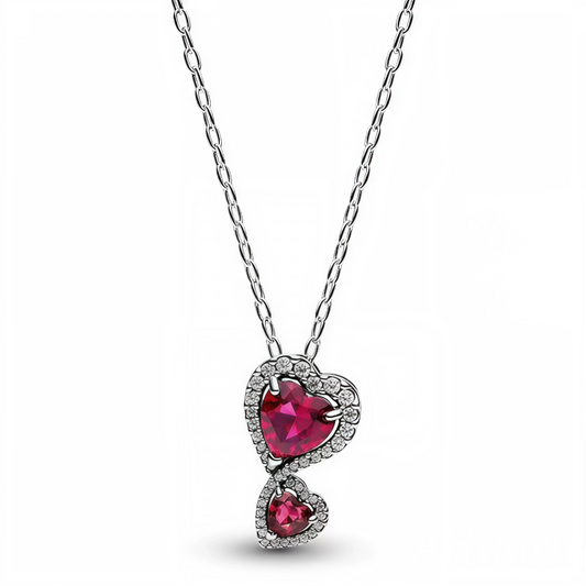Ce collier délicat met en valeur deux cœurs entrelacés, l'un rouge et l'autre rose, scintillant de strass argentés qui ornent leur contour. Symbolisant l'amour et l'harmonie, il ajoute une touche de romance et de brillance à toutes vos tenues. Un bijou à la fois élégant et intemporel, parfait pour sublimer n'importe quelle occasion spéciale ou apporter de la lumière à votre quotidien.