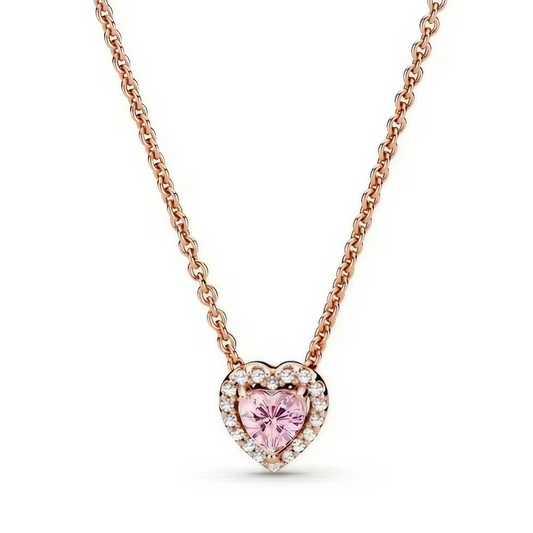 Ce magnifique collier met en valeur une pierre scintillante rose en forme de cœur, entourée d'un pavé étincelant qui capte la lumière à chaque mouvement. Son design élégant et romantique en fait l'accessoire idéal pour sublimer n'importe quelle tenue, ajoutant une touche de charme et de dynamisme.