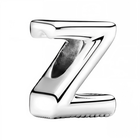 Personnalisez votre bracelet avec élégance grâce à ce charm en forme de lettre "Z", réalisé en argent 925. Un bijou simple et raffiné, idéal pour exprimer votre personnalité ou offrir une attention symbolique à un être cher.